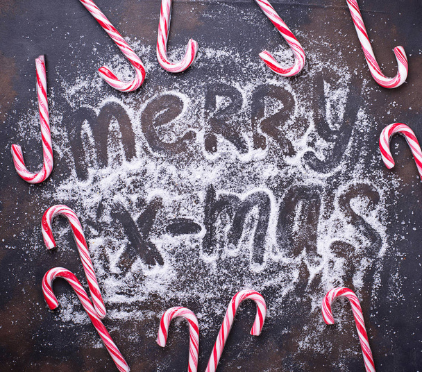 Χριστούγεννα φόντο με καραμέλα από ζαχαροκάλαμο - Φωτογραφία, εικόνα