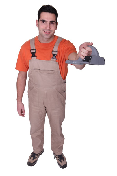 Handyman holding tool - Фото, изображение