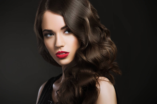 young beautiful woman, glamour portrait on dark background - Фото, изображение