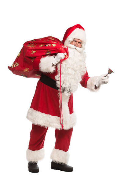 Święty Mikołaj z dzwonkiem na białym tle - Zdjęcie, obraz