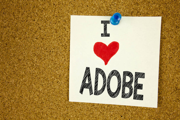 Escritura a mano texto pie de foto inspiración mostrando I Love ADOBE concepto que significa Software Company Name Loving escrito en nota adhesiva, recordatorio de fondo aislado con espacio de copia
 - Foto, Imagen