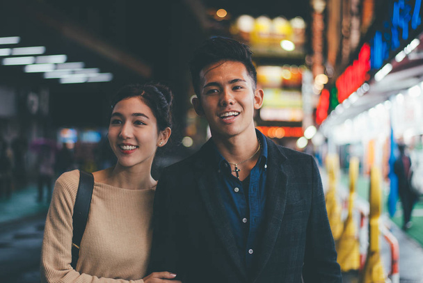 Young japanese couple spending time together in Tokyo - Photo, image