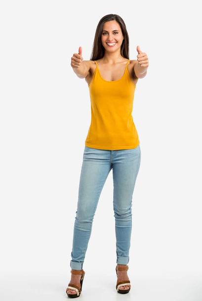 young woman showing thumbs up - Fotoğraf, Görsel