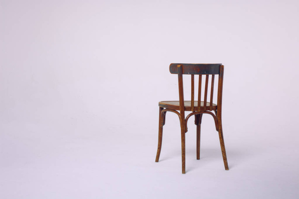 old wooden chair on a white background - Foto, Bild
