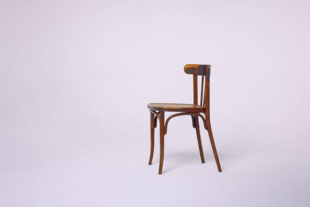 old wooden chair on a white background - Fotó, kép