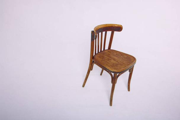 old wooden chair on a white background - Foto, afbeelding