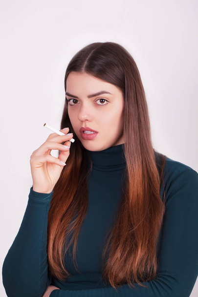 Quit Bad Habit. Beautiful Happy Woman Holding Cigarette - Фото, зображення