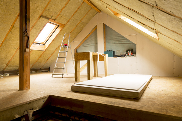 house attic under construction mansard wall insulation with rock - Photo, Image