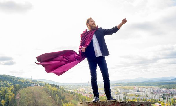 Successful man with a cape - 写真・画像