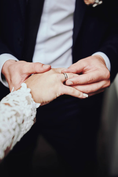 Bride and groom with wedding rings - Photo, image