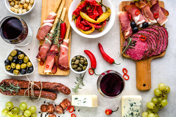 Spanish tapas, traditional food from spain, wine and appetizers on table, top view - Fotoğraf, Görsel