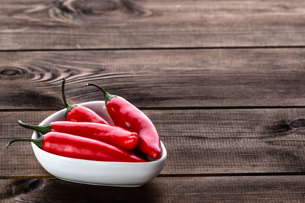 Red hot chili pepper or spicy chilli cayenne pepper, spice from mexican cuisine - Foto, Imagem