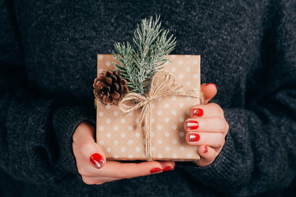 Woman's hands with christmas gift box - Fotó, kép