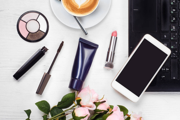 Cosmetics laptop cup of coffee cappuccino purse mobile phone smartphone - 写真・画像