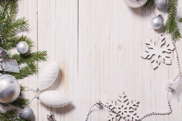 Silver Christmas decoration on wooden background - Foto, Imagen
