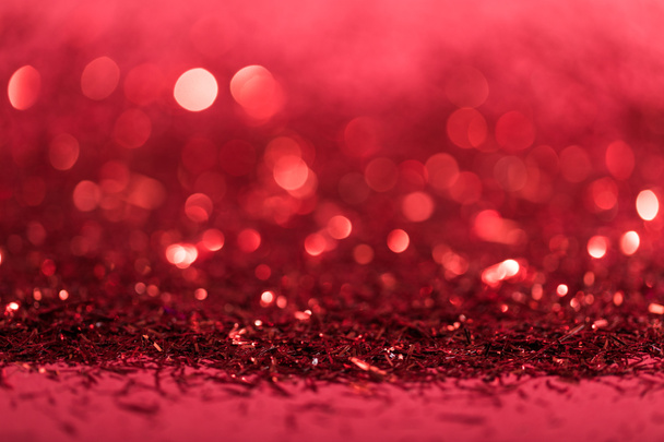 fondo de Navidad con confeti borroso brillante rojo
  - Foto, Imagen