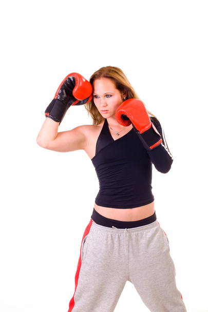 Attractive Caucasian girl practicing boxing, isolated on white background - Foto, immagini