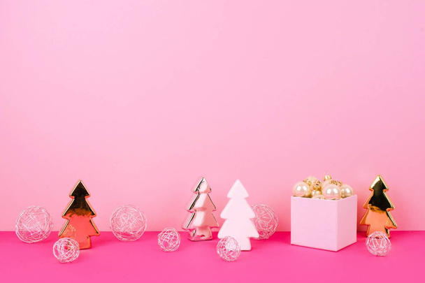 Christmas tree balls on a pink background - Valokuva, kuva