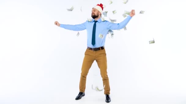 Dollars vallen op formeel geklede man in de Kerstman hoed - Video