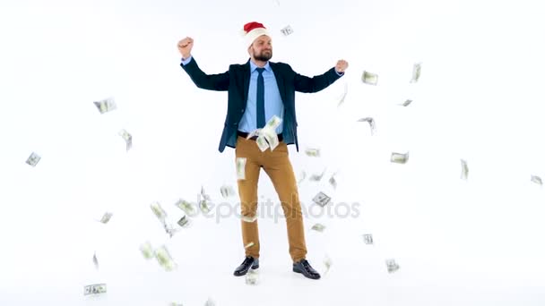 Slow motion resmen giyimli adam Noel Baba şapkalı düşüyor dolar - Video, Çekim