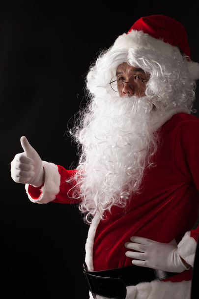 Santa Claus portrait on dark background - Foto, Imagem