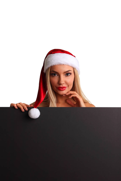 Santa girl holding blank billboard - 写真・画像