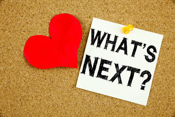 Hand writing text caption inspiration showing Question What's Next concept meaning What is Next Self-Development Improvement Love written on sticky note, reminder isolated background with copy space - Photo, Image