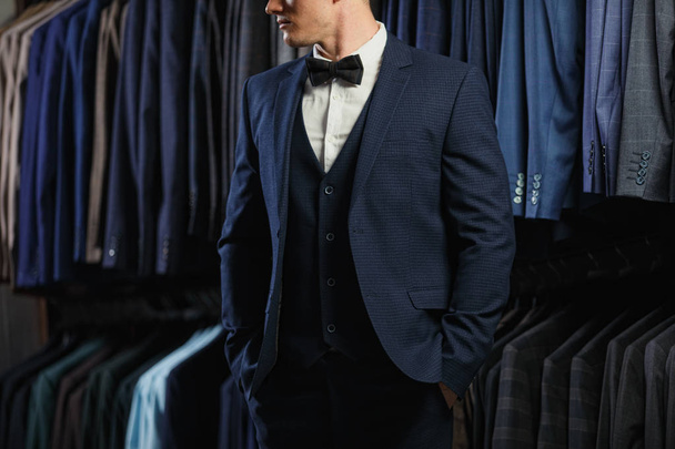 Perfect to the last detail. Modern businessman. Fashion shot of a handsome man in elegant classic suit. Mens beauty, fashion. - Fotó, kép