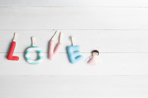  Valentine and love concept, Sewed pillow alphabet love quote for hang on the wall, Flat lay - 写真・画像