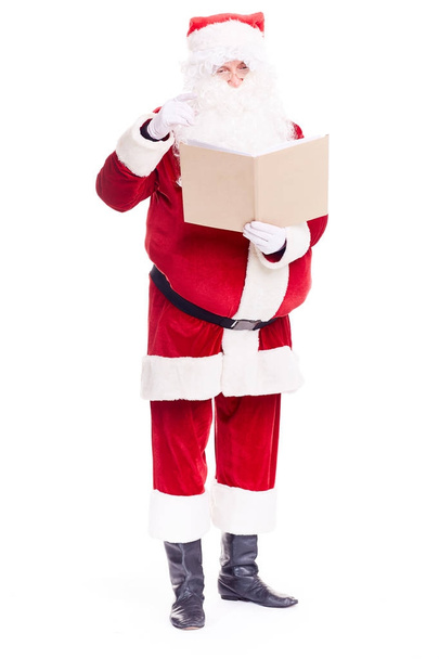 Santa Claus with book - Foto, imagen