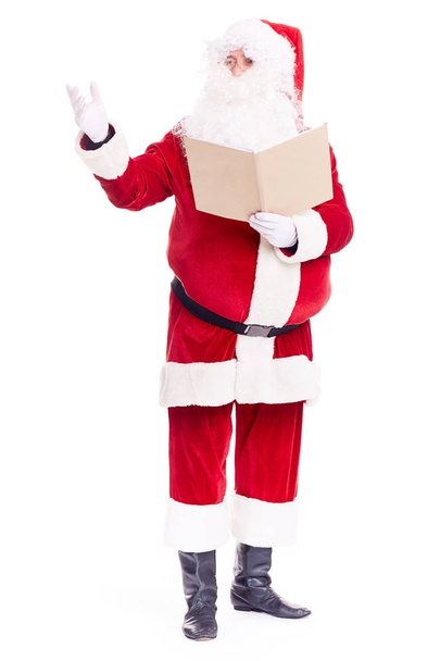 Père Noël avec livre
 - Photo, image