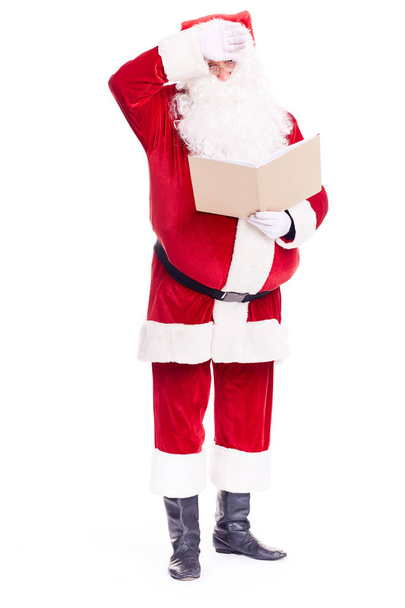 Santa Claus with book - Foto, afbeelding
