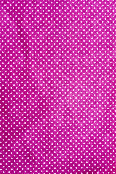 Морщинистая фиолетовая ткань с белой точкой
 - Фото, изображение