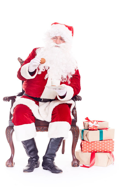 Santa eating cookies - Photo, image