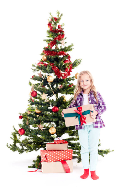 Girl near Christmas tree - Photo, Image