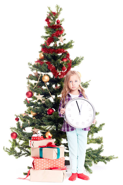 Girl near Christmas tree - Фото, зображення