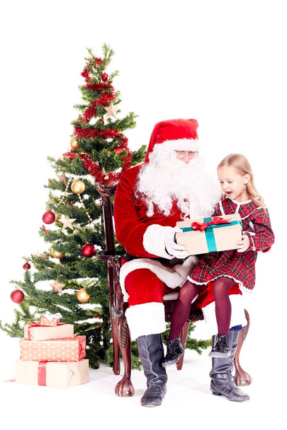 Getting gift from Santa Claus - Zdjęcie, obraz