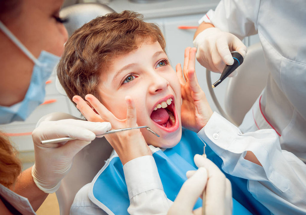 Crying and screaming little boy at the dentist  - Foto, Imagem