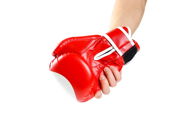 Hand holding red Boxing gloves. Two gloves sports. Isolated on a - Фото, изображение