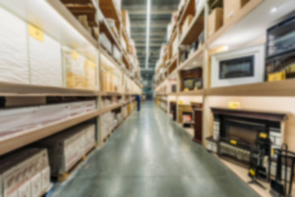 blurred view of shelves with boxes in shipping stock - Photo, Image
