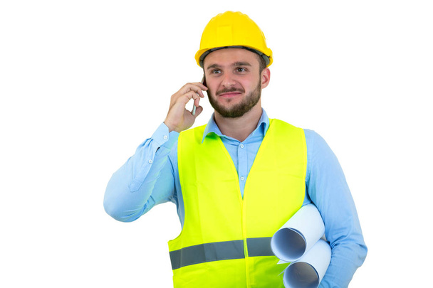 Angry upset young construction engineer yeling at the phone - Φωτογραφία, εικόνα