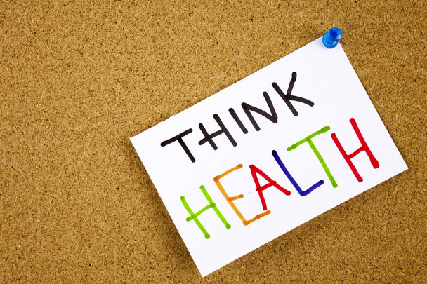 Nota de memorándum fijada a un tablero de anuncios de corcho como recordatorio Think Health
 - Foto, Imagen