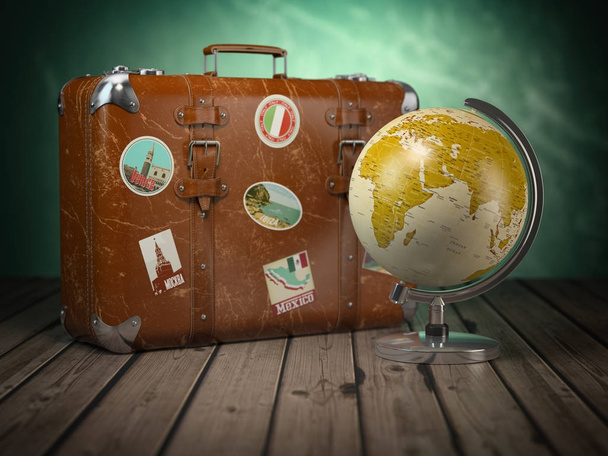 Old suitcase with globe on wood  background. Travel or tourism c - Foto, Imagen
