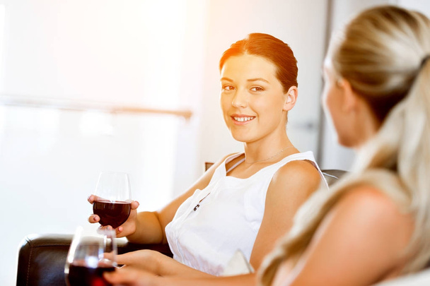 Female friends with glass of wine - Zdjęcie, obraz