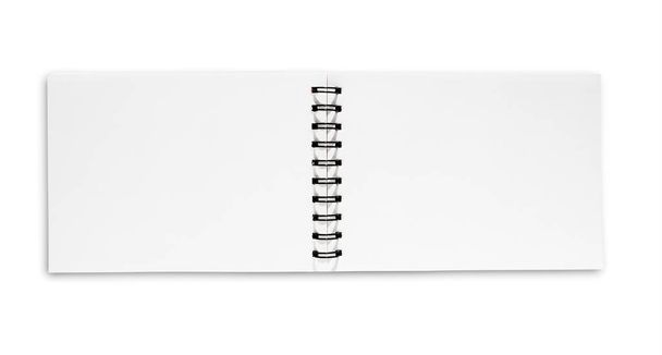 Вид зверху відкритого спірального ноутбука на білому тлі
  - Фото, зображення