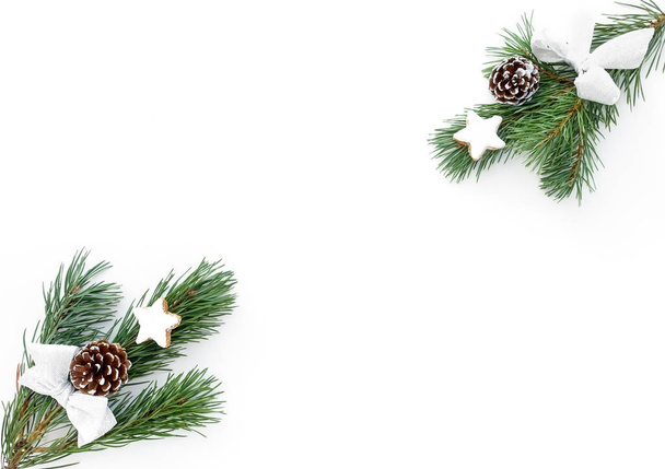 Two Twigs of Fir with Christmas Decoration and Cinnamon Star Coo - Фото, изображение