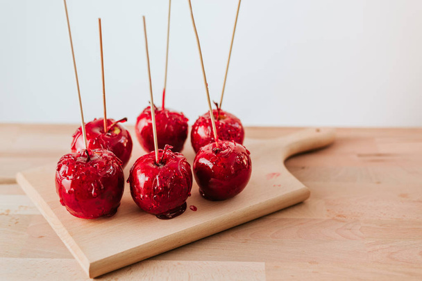 yummy candy apples on background . - Photo, Image