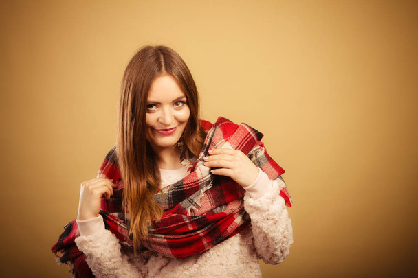 Woman wearing woolen checked scarf warm autumn clothing - Zdjęcie, obraz
