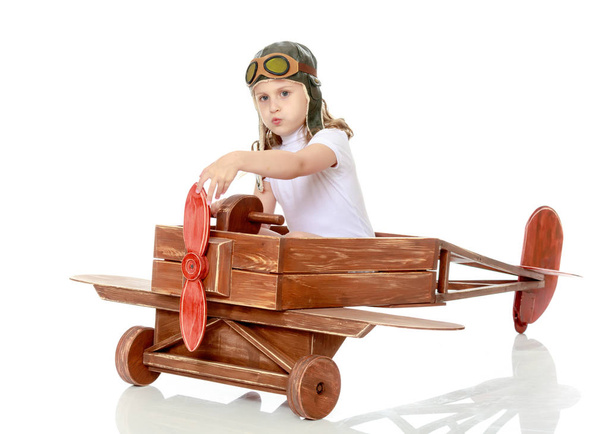 Little girl in the cap of the pilot - Photo, Image