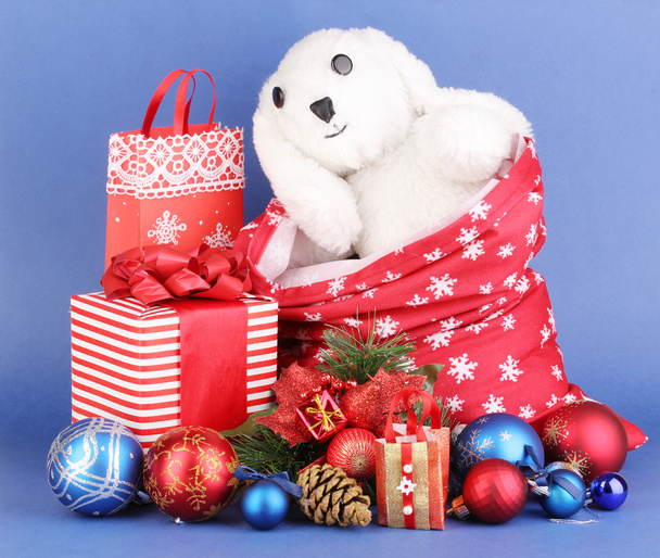 New Year composition of New Year's decor and gifts on blue background - 写真・画像